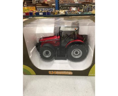 A BOXED UNIVERSAL HOBBIES MASSEY FERGUSON 8690 1:32 DIECAST TRACTOR 