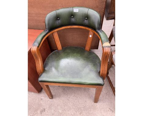 A MODERN BUTTON BACK TUB CHAIR 
