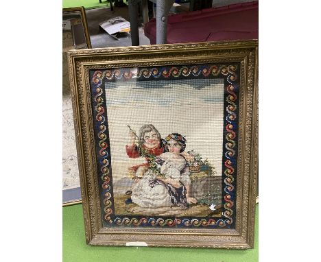 A VINTAGE FRAMED TAPESTRY OF A COURTING COUPLE 