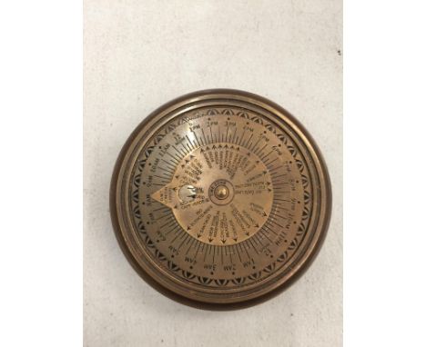 A BRASS SUNDIAL COMPASS 