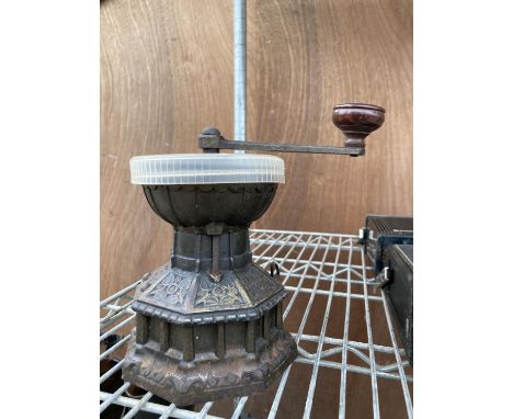 A DECORATIVE VINTAGE GRINDER 