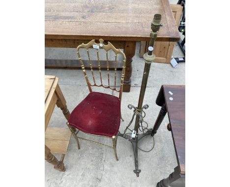 A MODERN BRASS FUNCTION CHAIR AND A BRASS ART NOUVEAU STANDARD LAMP 