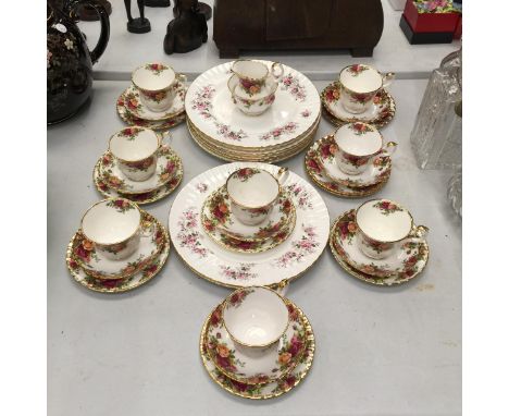 A QUANTITY OF ROYAL ALBERT 'COUNTRY ROSES' TRIOS, MAINLY FIRST QUALITY, PLUS NINE ROYAL ALBERT 'LAVENDER ROSE' DINNER PLATES 