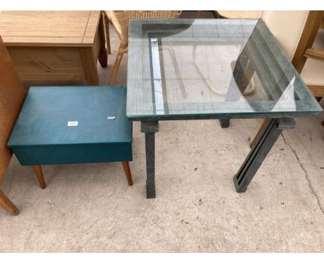 A MODERN GLASS TOP LAMP TABLE ON A METALWARE BASE 24" SQUARE WITH GREEN TINGE AND A 1960'S WORKBOX/STOOL 