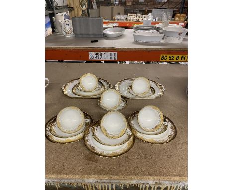 A HAMMERSLEY AND CO, LONGTON NAVY BLUE, GOLD AND WHITE TEA CUPS AND SAUCERS 1912-39 