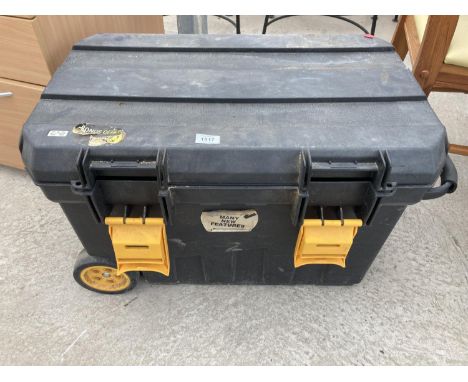 A LARGE PLASTIC TOOL BOX WITH A MITRE SAW 