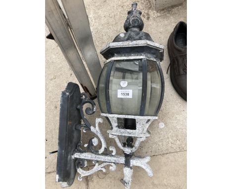 A LARGE DECORATIVE OUTSIDE LIGHT 