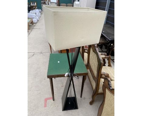 A MODERN BLACK X-FRAME STANDARD LAMP WITH SHADE 
