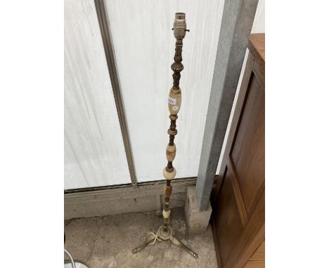A MODERN ONYX AND METALWARE TRIPOD STANDARD LAMP 