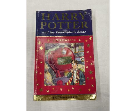 A FIRST EDITION HARRY POTTER AND THE PHILOSOPHER'S STONE BY J K ROWLING 