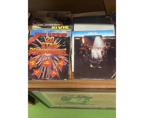 A QUANTITY OF LP VINYL RECORDS TO INCLUDE ELO, ABBA, BARRY MANILOW, ELTON JOHN, ELVIS, ETC 