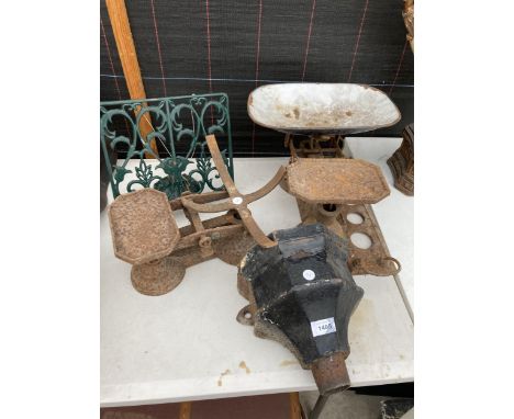 FOUR VINTAGE ITEMS TO INCLUDE TWO SETS OF SCALES, A CAST IRON GUTTER HOPPER AND A COOK BOOK STAND 