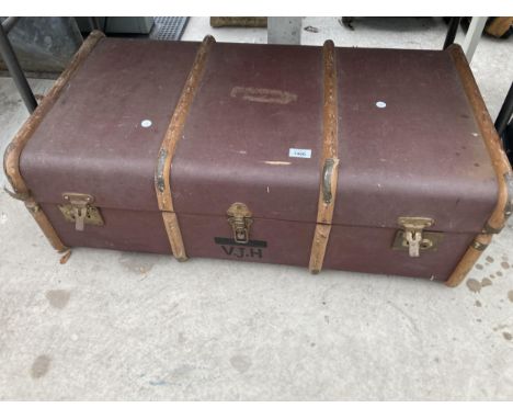 A LARGE VINTAGE WOODEN BOUND TRAVEL CASE 