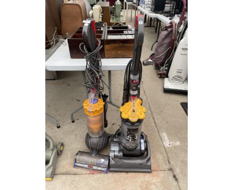 A DYSON LIGHT BALL VACUUM CLEANER AND A FURTHER DYSON DC33 VACUUM CLEANER 