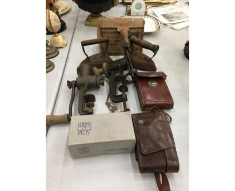 A COLLECTION OF VINTAGE ITEMS TO INCLUDE FLAT IRONS, CAMERA, TABLE TOP MINCER AND SLICER, ETC 