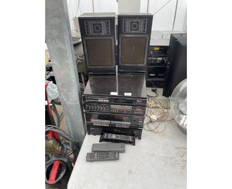 A SHARP STEREO SYSTEM WITH RECORD PLAYER AND TWO SHARP SPEAKERS 