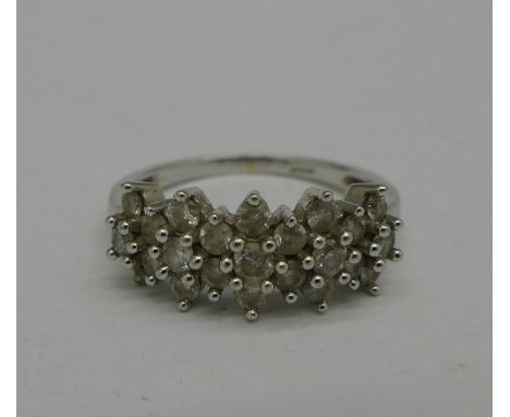 A 9ct gold and diamond cluster ring, one diamond missing, 3.2g, O