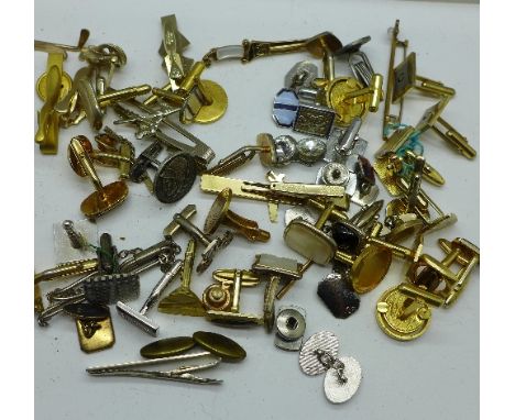 Assorted cufflinks and tie pins
