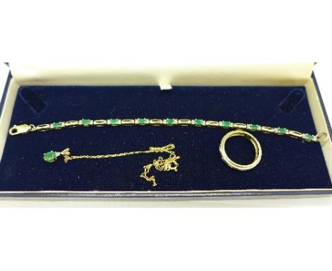 A 9ct gold, emerald and diamond bracelet, a 9ct gold ring and a 9ct gold, emerald and diamond pendant with chain, total weigh