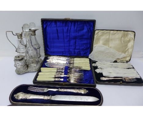 A cased pastry serving set with silver handles, a four-piece cruet set and two cases of flatware