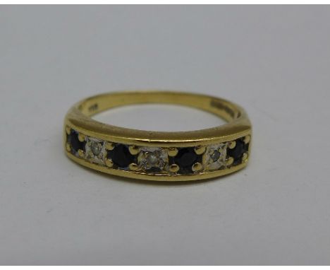 A 9ct gold, diamond and sapphire ring, 2.6g, P