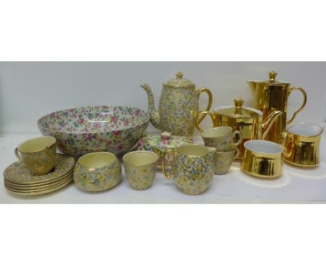 A Royal Winton Grimwades tea set, a Royal Winton butter dish, chintz fruit bowl, a/f and a Royal Worcester gold lustre teapot