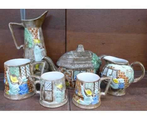 Six items of E. Radford pottery including teapot and ewer