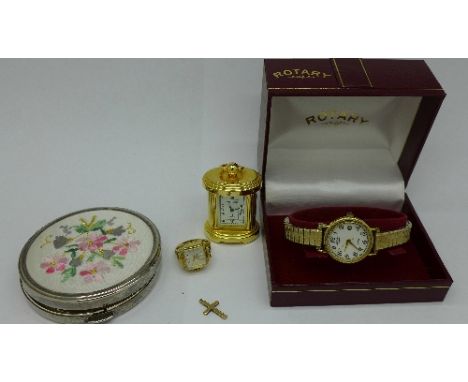 A 9ct gold cross, 0.9g, a compact, a Hamilton ring watch, a lady's Rotary wristwatch, boxed, and a miniature clock