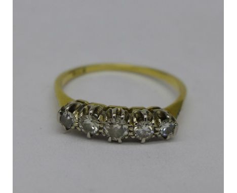 An 18ct gold and five stone diamond ring, 2.4g, O