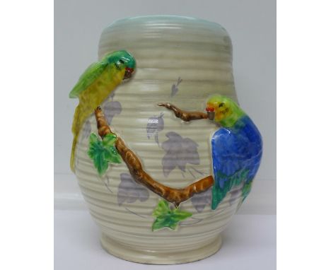 A Clarice Cliff budgerigar vase, 21cm