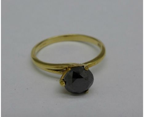 A 9ct rose gold and black stone ring, 1.6g, N