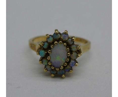 A 9ct gold and opal cluster ring, 2.1g, K