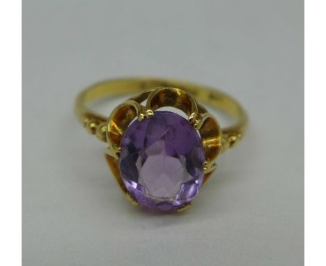 A 9ct gold and amethyst ring, 2.3g, N