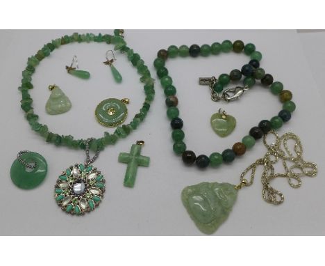 A collection of jade and hardstone jewellery including a 14ct gold mounted pendant
