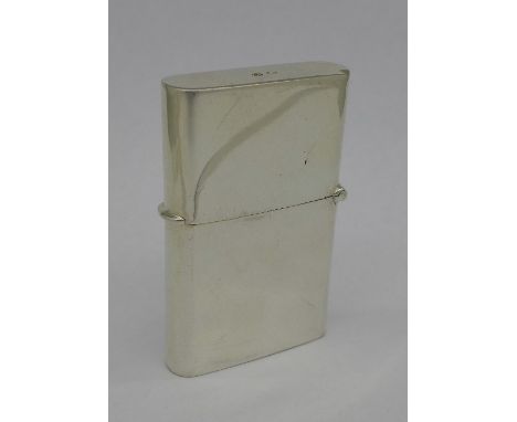 A silver cased lighter