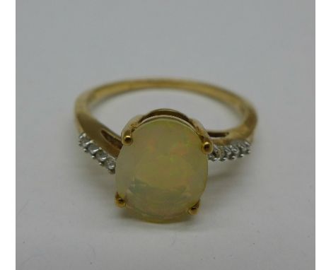 A 9ct gold and faceted opal ring, 2.2g, O