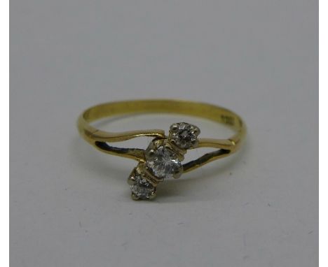 An 18ct gold and three diamond ring, 1.7g, O, shank repaired