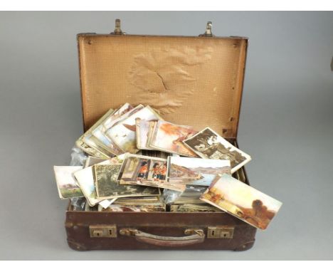 Leather suitcase containing selection of Edwardian and later postcards including topographical and botanical etc Note: These 