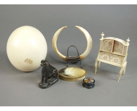 Tray containing an Anglo-Indian pierced ivory miniature bureau cabinet, damaged, 19th century oval horn snuff box, cased pipe