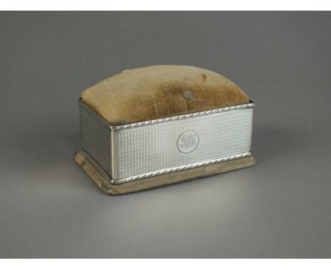 A silver mounted pin cushion box, Goldsmiths & Silversmiths, London, the silver mount with engine turned decoration and engra