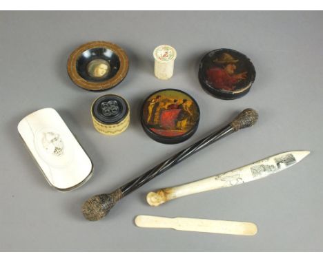 Two 19th century lacquer snuff boxes with printed covers, damaged, 9cm diameter, an animal bone paper knife, insized with a b