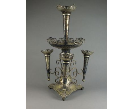 A large silver plated epergne, designed as a central trumpet vase with pierced rim mounted to large shallow bowl, all raised 