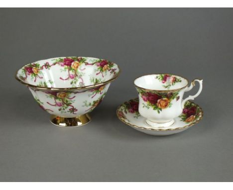 A Royal Albert 'Old Country Roses' tea service together with matching bowl, contained in box.