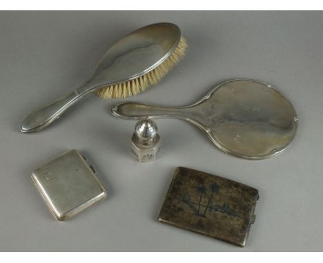 A group of silver to include an engine-turned cigarette case, a dressing table mirror and brush, an Indian white metal cigare