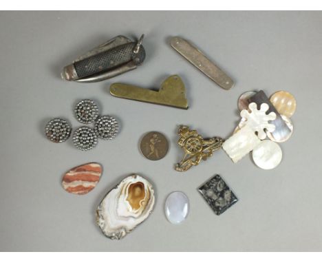 Four cut steel buttons, together with mother of pearl game counters, a boxing medallion, agate specimens, pocket knives etc (