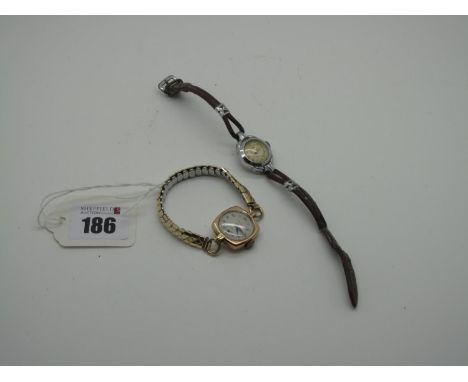 Rotary; A 9ct Gold Cased Ladies Wristwatch, the signed dial with black Arabic numerals and seconds subsidiary dial, within cu