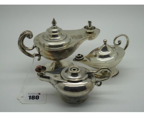 Three Hallmarked Silver 'Genie' Lamp Lighters, largest 15.5cm long, with flying scroll handle, raised on oval pedestal base (