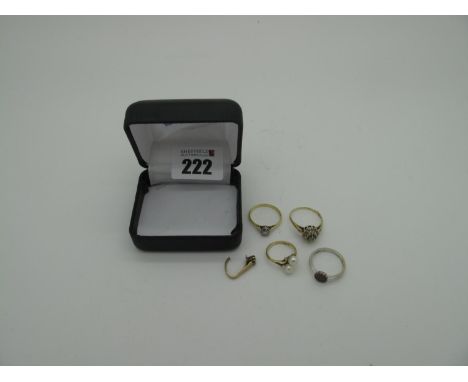 An 18ct Gold Single Stone Ring, (finger size N), (2grams); together with three 9ct gold dress rings, of various designs (fing