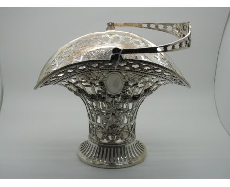 WMF; A Highly Decorative Plated Swing Handled Basket, of openwork design, detailed in relief with rose garland swags, overall