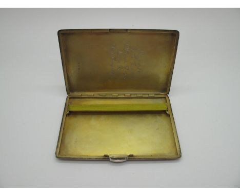 A Hallmarked Silver Cigarette Case, WHM, Birmingham 1945, of rectangular form, allover engine turned, gilt lined and inscribe